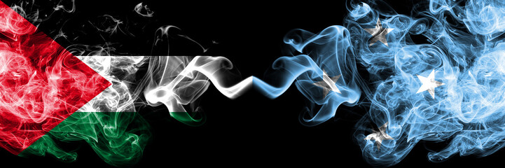 Palestine vs Micronesia, Micronesian smoky mystic flags placed side by side. Thick colored silky smokes flag of Palestinians and Micronesia, Micronesian