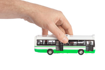 Canvas Print - Hand with toy bus