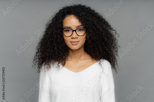 Portrait Of Serious Woman With Dark Skin Afro Bushy Hair