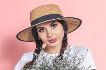 Canvas Print - Portrait of beautiful young woman with flowers