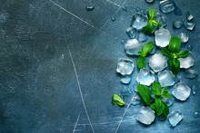 Food Background With Ice Cubes And Mint Leaves. Top View With Copy Space.