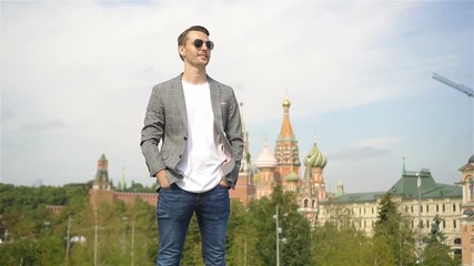 Wall Mural - Happy young urban man in european city.