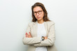 © Asier - Young european business woman unhappy looking in camera with sarcastic expression.