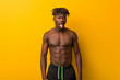 © Asier - Young black man shirtless wearing swimsuit funny and friendly sticking out him tongue.