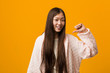 © Asier - Young chinese woman in pajama feels proud and self confident, example to follow.