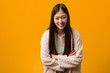 © Asier - Young chinese woman in pajama laughing and having fun.