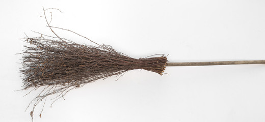 Wall Mural - old broom for sweeping, Halloween broom for witch on a white background