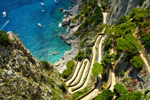 Aerial View Of Via Krupp Leading To The Blue Sea Off The Coast Of The Island Of Capri, Italy
