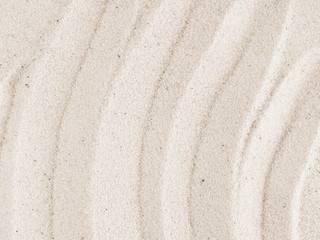 Sand on the beach as background. Sand Texture. Brown sand. Background from fine sand.