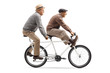Two elderly men riding a tandem bicycle with legs up