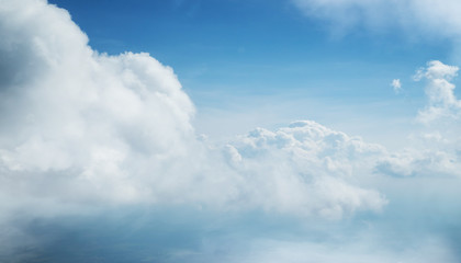 Wall Mural - Dramatic blue sky background with white clouds