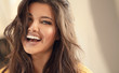© neonshot - Young brunette woman with amazing smile.