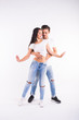 © satura_ - Salsa, kizomba and bachata dancers on white background. Social dance concept