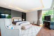 © Stock PK - real estate Luxury Interior design in bedroom of pool villa with cozy king bed.