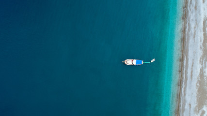 Poster -  Aerial view of beautiful natural background at the summer time. Aerial view of tropical island beach holiday yacht on blue reef ocean. Holiday icons