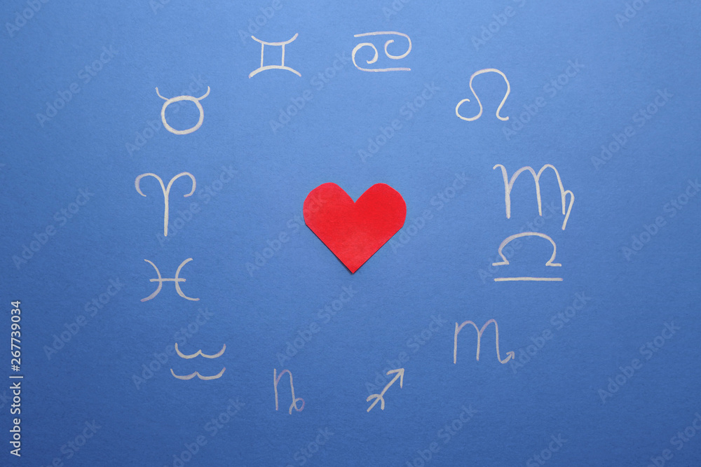 Zodiac signs and red heart on color background. Love horoscope concept