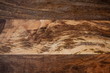 The contrasting pattern of wood on a wooden board from mango tree. The texture of the mango tree