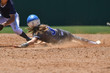 © Joe - Young girls playing the sport of fastpitch softball