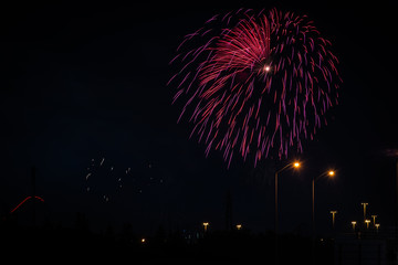 Color fireworks on black sky background