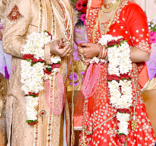 The Bride And Groom At The Indian Wedding Garlands Or Jaimala