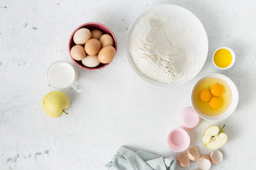 Bakery background. Baking ingredients for cooking homemade apple pie top view