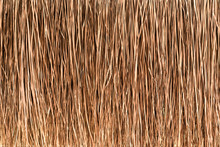 Thatched Roof Or Wall Background. Tropical Roofing On Beach