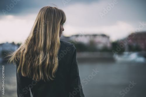 Cuadros en Lienzo Portrait of lonely and pensive woman who is looking at distance.