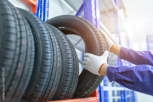 Fotografía Tires in a tire store, Spare tire car, Seasonal tire change, Car maintenance and service center