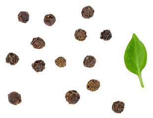 Wall Mural - Black peppers peas isolated on white, top view