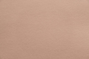 Wall Mural - abstract beige glossy paper texture background or backdrop. light brown cardboard or shiny paperboar