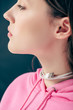 © LIGHTFIELD STUDIOS - pretty young girl with usb cable around neck isolated on green background