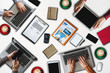 © Nuttapong punna - Top view of businessman Group of Multiethnic Busy People meeting with other in modern office with laptop computer, smartphone, tablet, coffee and document on table. People corporate business team conc