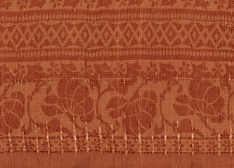 Fond orange textile à motifs abstraits