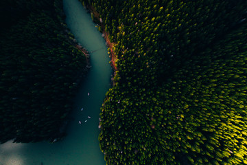 Wall Mural - Lake with small boats seen from a drone