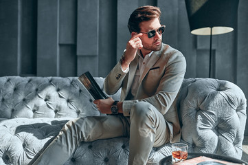 Wall Mural - Stylish man at home