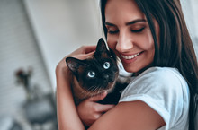 Woman At Home With Cat