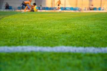 Football field grass with chalk line