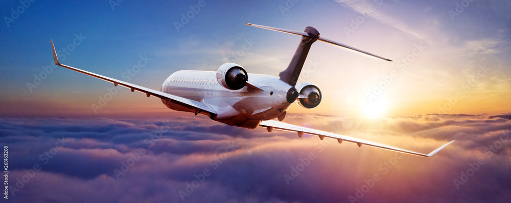 Private jet plane flying in sunset - obrazy, fototapety, plakaty 