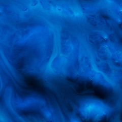 Wall Mural - Abstract blue paint background. Defocused color liquid fluid gradient flowing spreading covering chaotically flat surface.