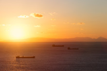 Three Ships At Sunset