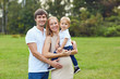 © Studio Romantic - Happy family together in the summer park.
