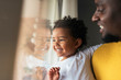 © Santi Nunez/Stocksy - Happy father and his daughter having fun at home.