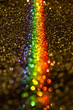 © Pixel Stories/Stocksy - Golden glitter with a prism of light