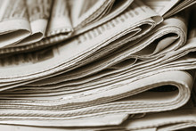 News Concept, Folded Newspaper Closeup.