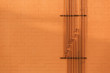 © Raymond Forbes LLC/Stocksy - Orange Wall with Network Pipes
