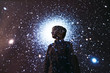 © Rob and Julia Campbell/Stocksy - Young girl with stars and galaxies projected on her