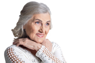 Wall Mural - Gorgeous mature woman posing on white background