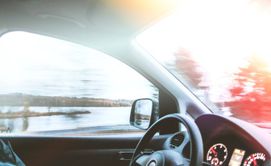 View through the moving car windscreen.