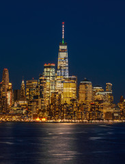 Fototapete - Lower Manhattan which is a apart of New york cityscape river side which can see One world trade center at twilight time, USA, Taking from New Jersey