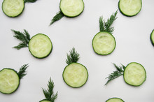 Sliced Cucumbers On A Light Background